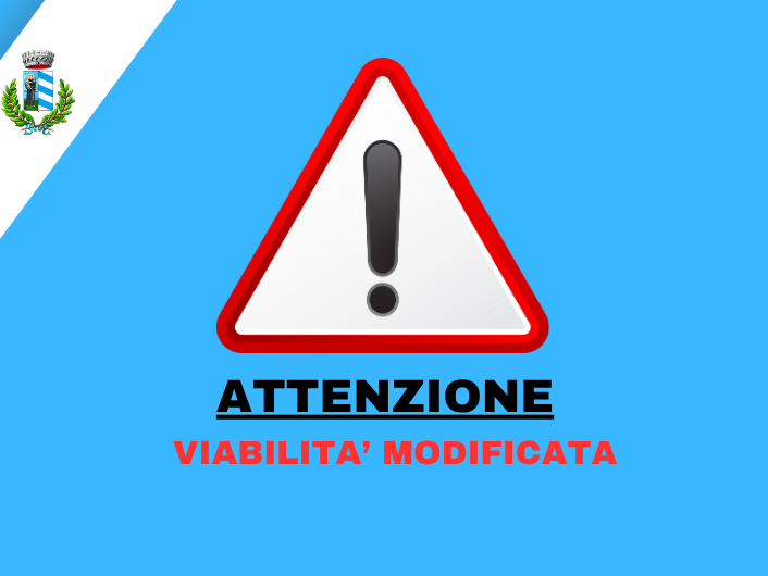 Immagine con cartello stradale di pericolo con scritta Attenzione viabilità modificata